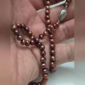 Collier de vraie perles naturelles avec un fermoir en argent
